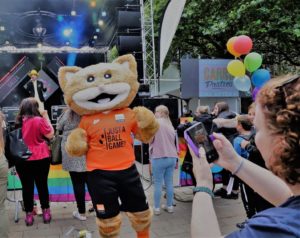 Castro , giant cat wearing football shirt with Just a Ball Game Logo